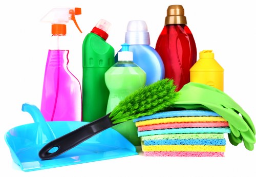 Carpet cleaning team preparing equipment safely in E11