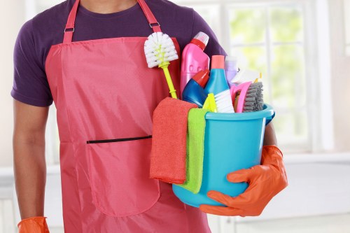 Professional upholstery cleaning for a sofa in an E11 home