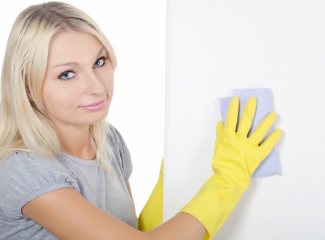 A local office cleaning team working in a mixed-use E11 commercial property